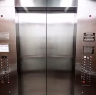 stainless steel elevator door with buttons